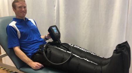 Image Of A Man On The Normatec Product